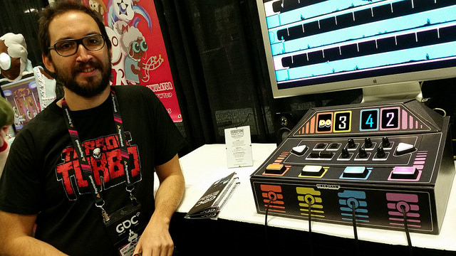 Maximo Balestrini (pictured) and Hernan Saez (not pictured) created Dobotone, a four-player game played with only two buttons each. A series of minigames are played and modified by the knobs on the console: difficulty, gravity, zoom and other gameplay elements can be adjusted.